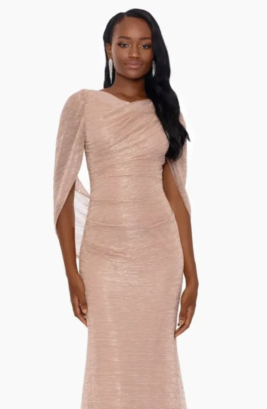 model is wearing a champagne evening dress