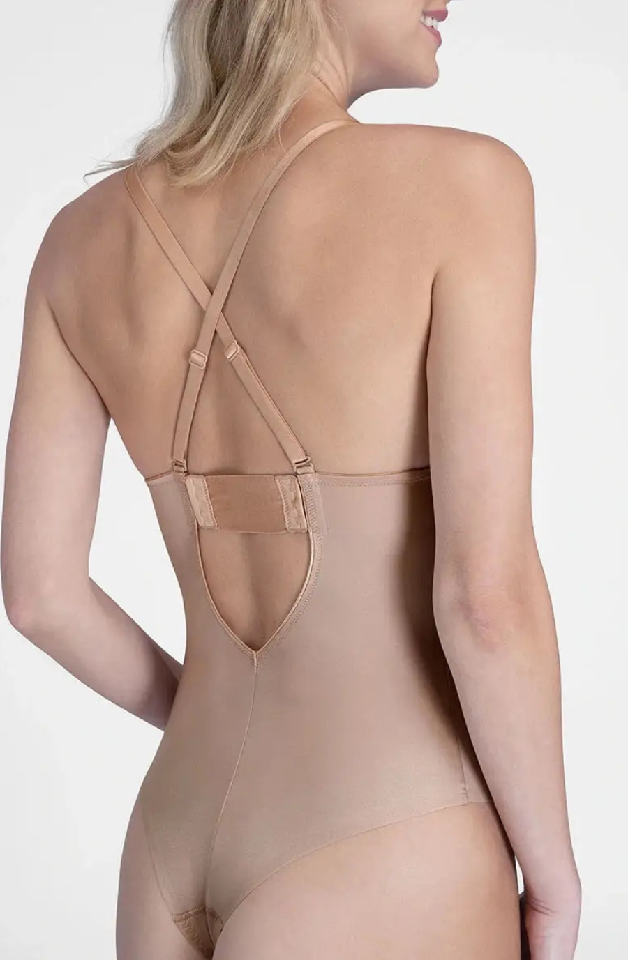 model is wearing open back shapewear