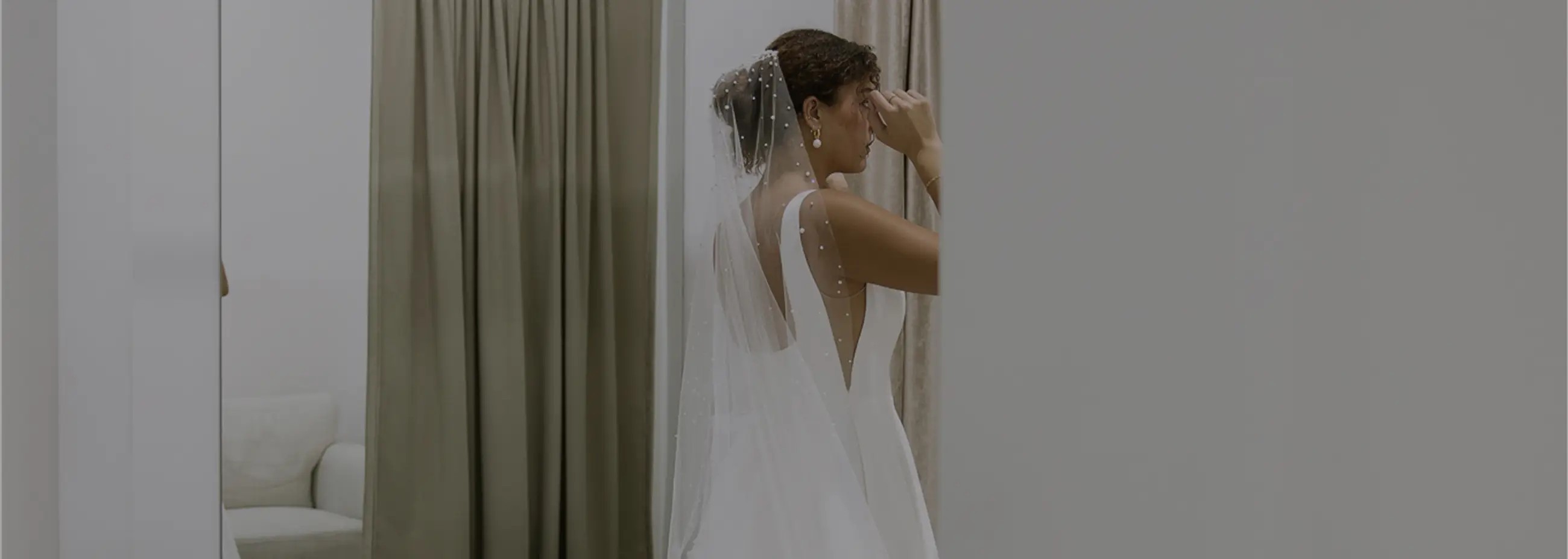 Photo of the model wearing a white bridal gown - Mobile image