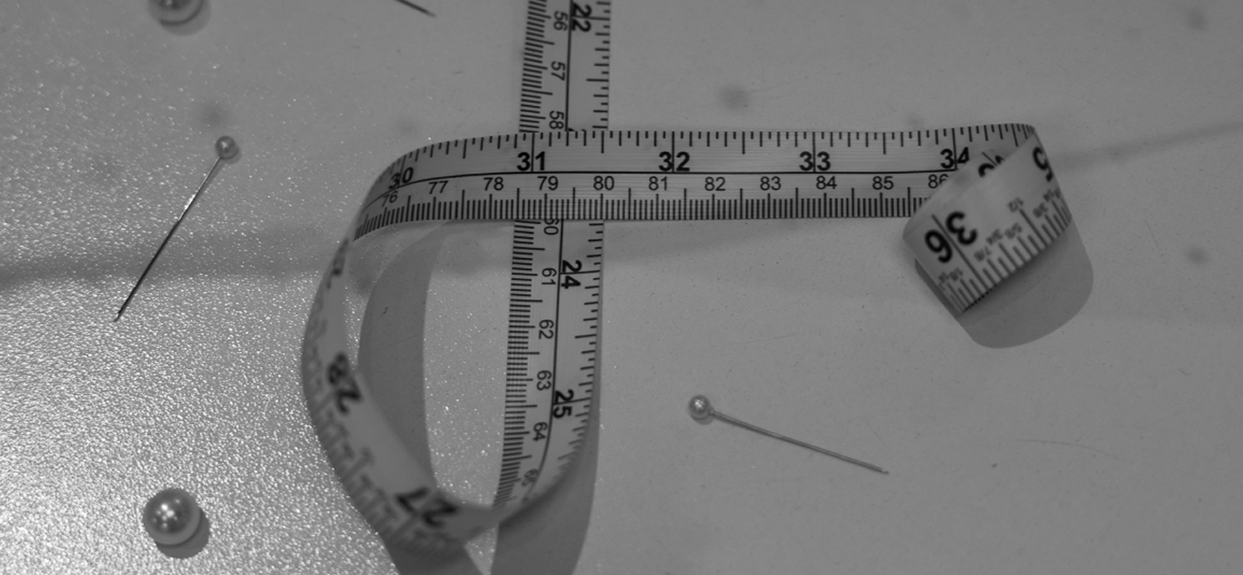 Photo of the model wearing a white bridal gown - Desktop Image