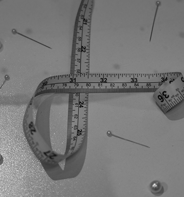 Photo of the model wearing a white bridal gown - Mobile image